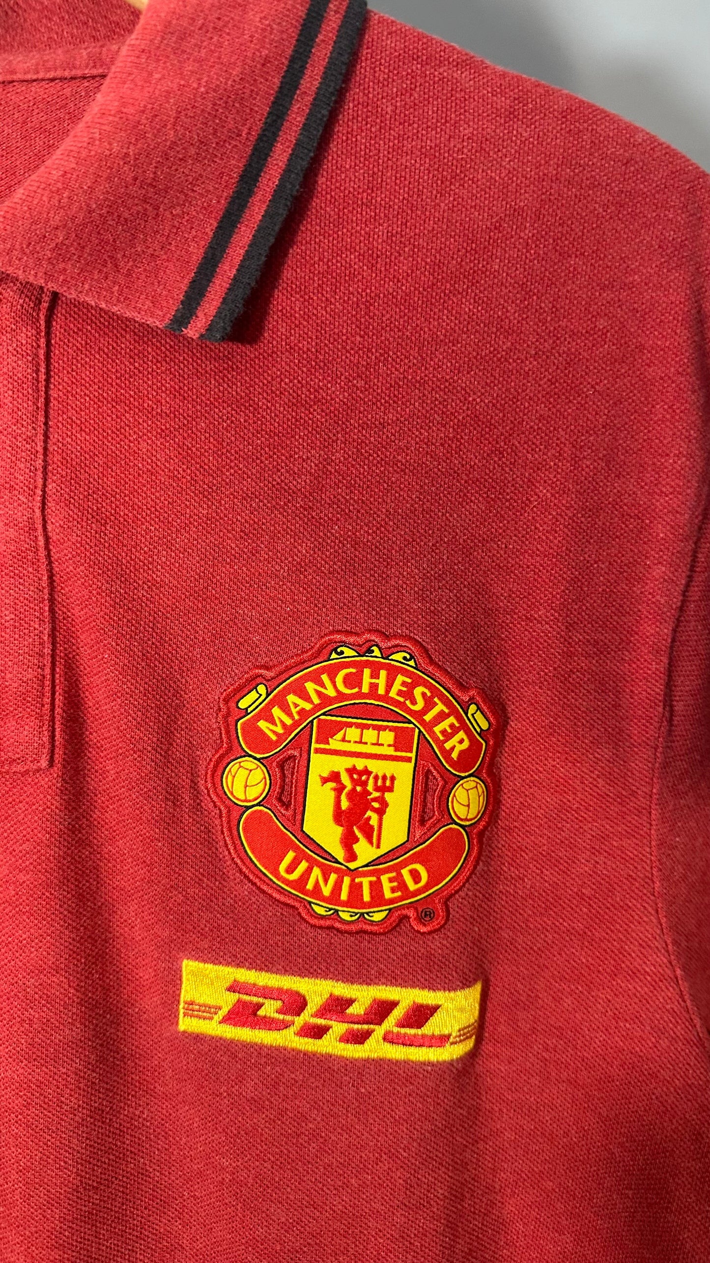 MAN UTD 2011 TRAVEL POLO (L)